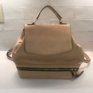 Adjustable mini back pack. Perfect for fall!